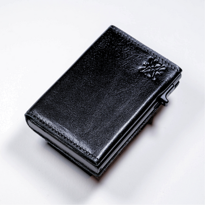 black minimalist leather wallet Classè front view premium black leather minimalist wallet design elegant black leather wallet genuine texture slim black leather wallet men minimalist design black minimalist leather wallet on surface Classè luxury black leather wallet texture detail compact black leather wallet elegant design modern minimalist black leather wallet design premium black leather wallet men style Classè black leather wallet premium finish